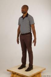 Whole body black white striped shirt brown jeans brown shoes of Arturo